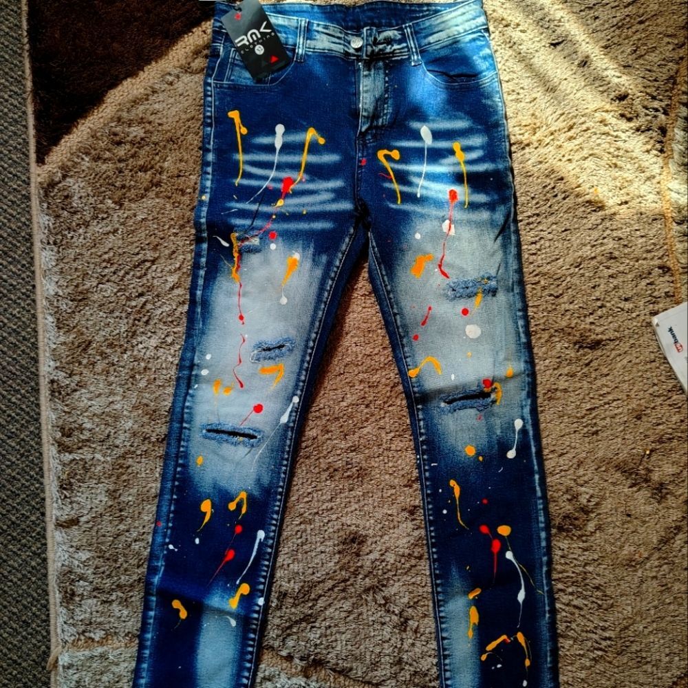 Trendy Blue Jeans with Colorful Splatter